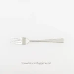 Stainless steel fork with a sleek design, suitable for food service or catering venues emphasizing hygiene and durability.
