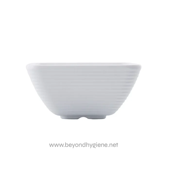 White ceramic bowl with horizontal ridges for hygiene and dining purposes.
