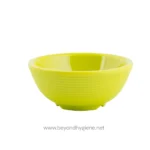 Bright yellow ceramic bowl for kitchen or dining use, modern design, lightweight and durable, suitable for serving food or decorative purposes, ideal for food presentation and table setting.