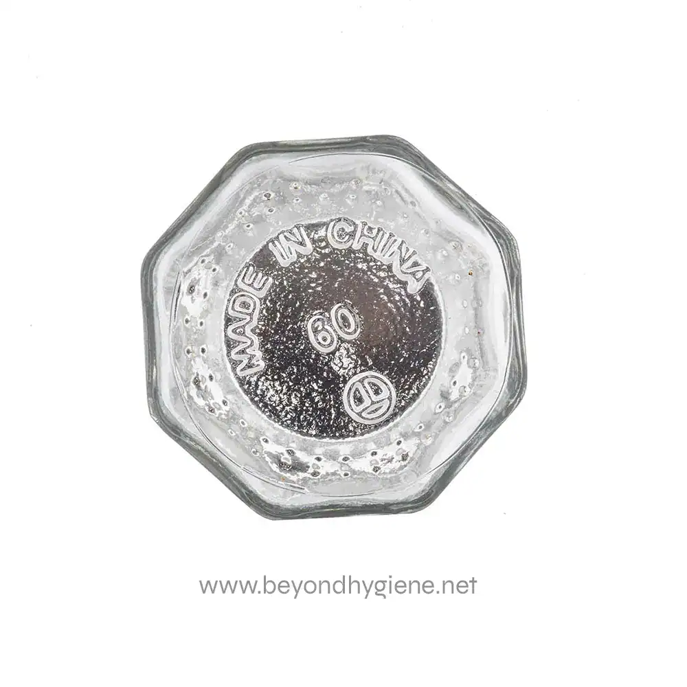 3 Stainless steel screw cap with "Made in China" inscription, used for bottles or containers, likely for hygiene or sanitization purposes.