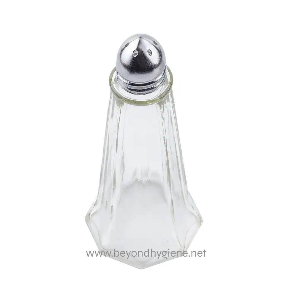 3 Stainless steel salt shaker on clear glass container, ideal for restaurant or home table settings. Durable and hygienic, perfect for seasoning dishes with salt.