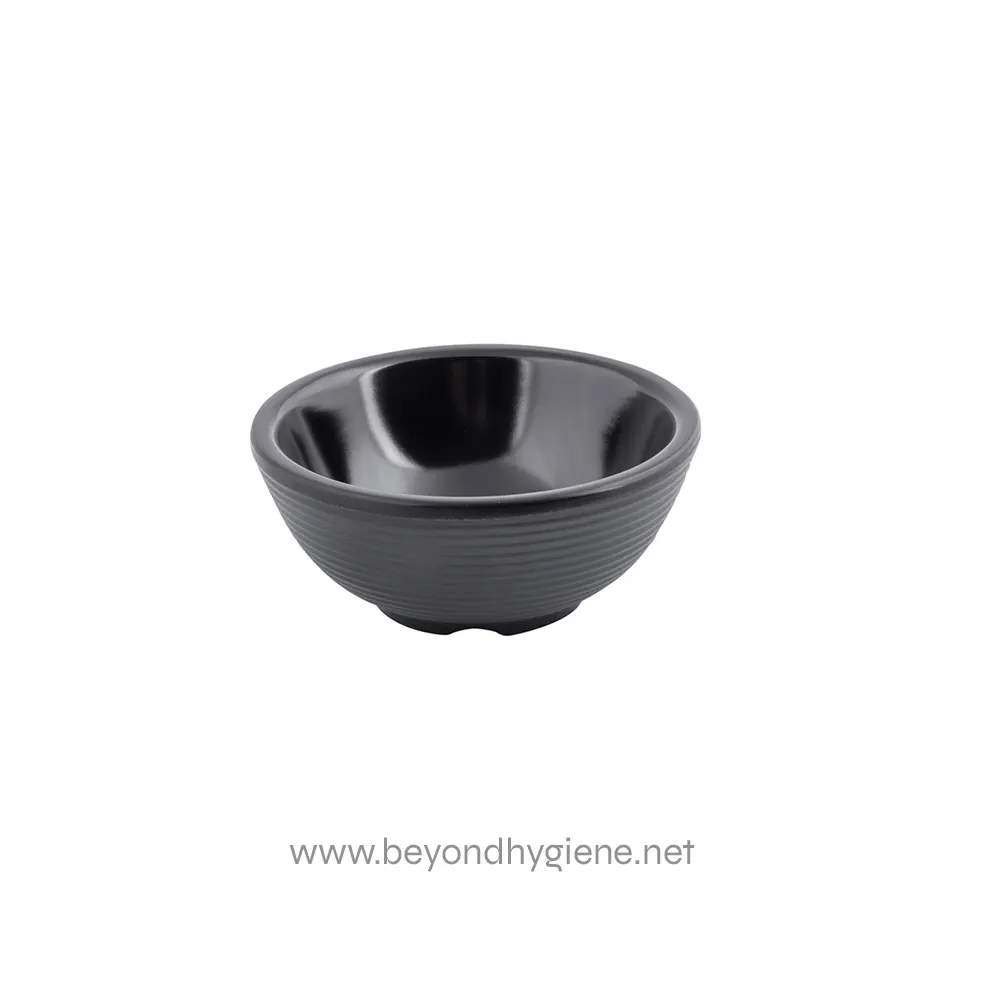 Black ceramic bowl for food or decor, sleek design, versatile, suitable for Asian cuisine or modern table settings.