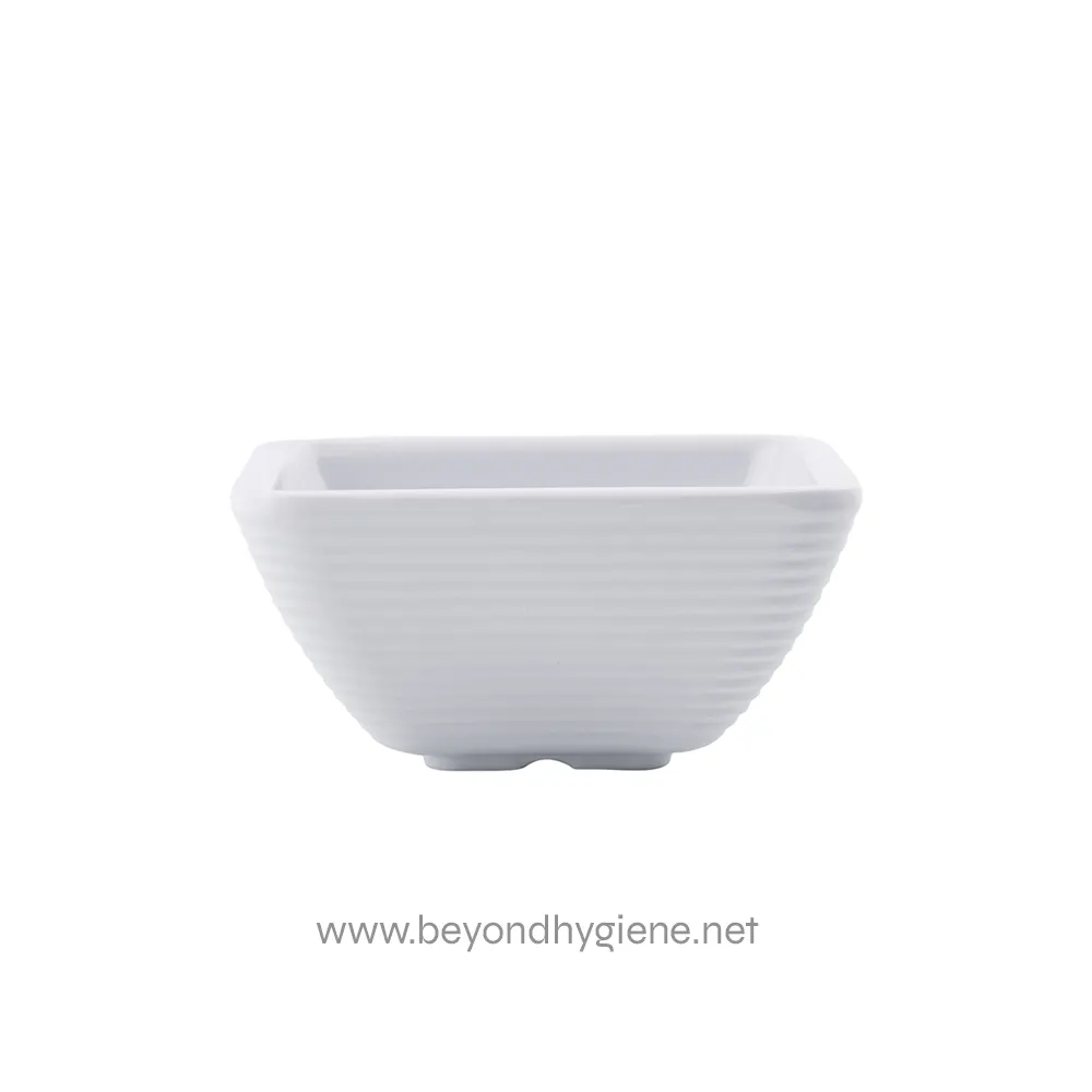 4 White ceramic rectangular serving bowl with horizontal ridges, ideal for dining and catering, showcasing modern, clean design.