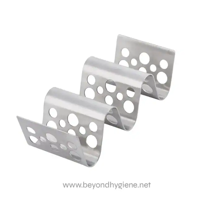 Stainless steel surgical instrument holder with multiple perforations, used for organizing medical tools in healthcare settings.