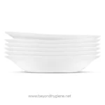White ceramic dishware stack for hygienic dining, clean and minimalist design ideal for restaurants, cafes, and food service establishments emphasizing hygiene and quality.