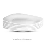 Stacked white ceramic plates for kitchenware and dining, showcasing hygiene and quality for restaurants or home use. Perfect for clean, sanitary dining environments.