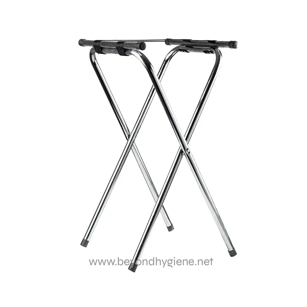 6 Stainless steel luggage rack with black rubber grips, portable and sturdy, ideal for travel or hotel accommodations.