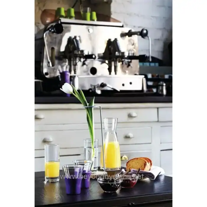 Freshly brewed espresso machine with breakfast setup, promoting commercial kitchen cleaning and hygiene services by Beyond Hygiene Asia.