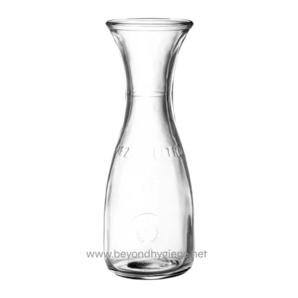 Clear glass water decanter with a modern, elegant design for hygiene and beverage serving.