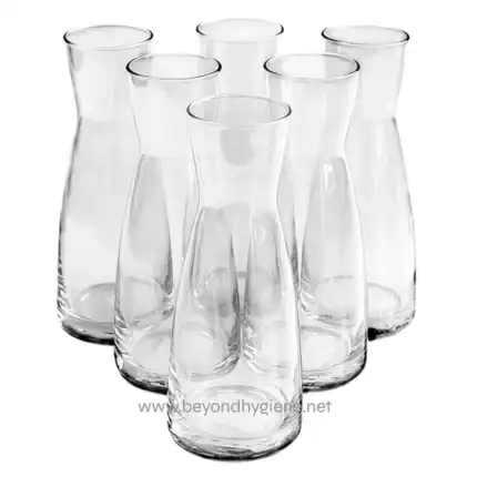 Clear glass tumblers perfect for beverage service, showcasing hygiene and cleanliness in retail and hospitality settings. Durable and stylish for everyday use.