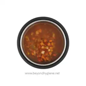 Steamed or boiled food in a stainless steel container, prepared for hygiene and sanitation. Ideal for food safety in healthcare, hospitality, or catering environments.