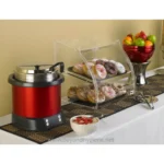 Freshly baked donuts and healthy fruit options on a buffet table, emphasizing hygiene and food safety standards at Beyond Hygiene Asia.