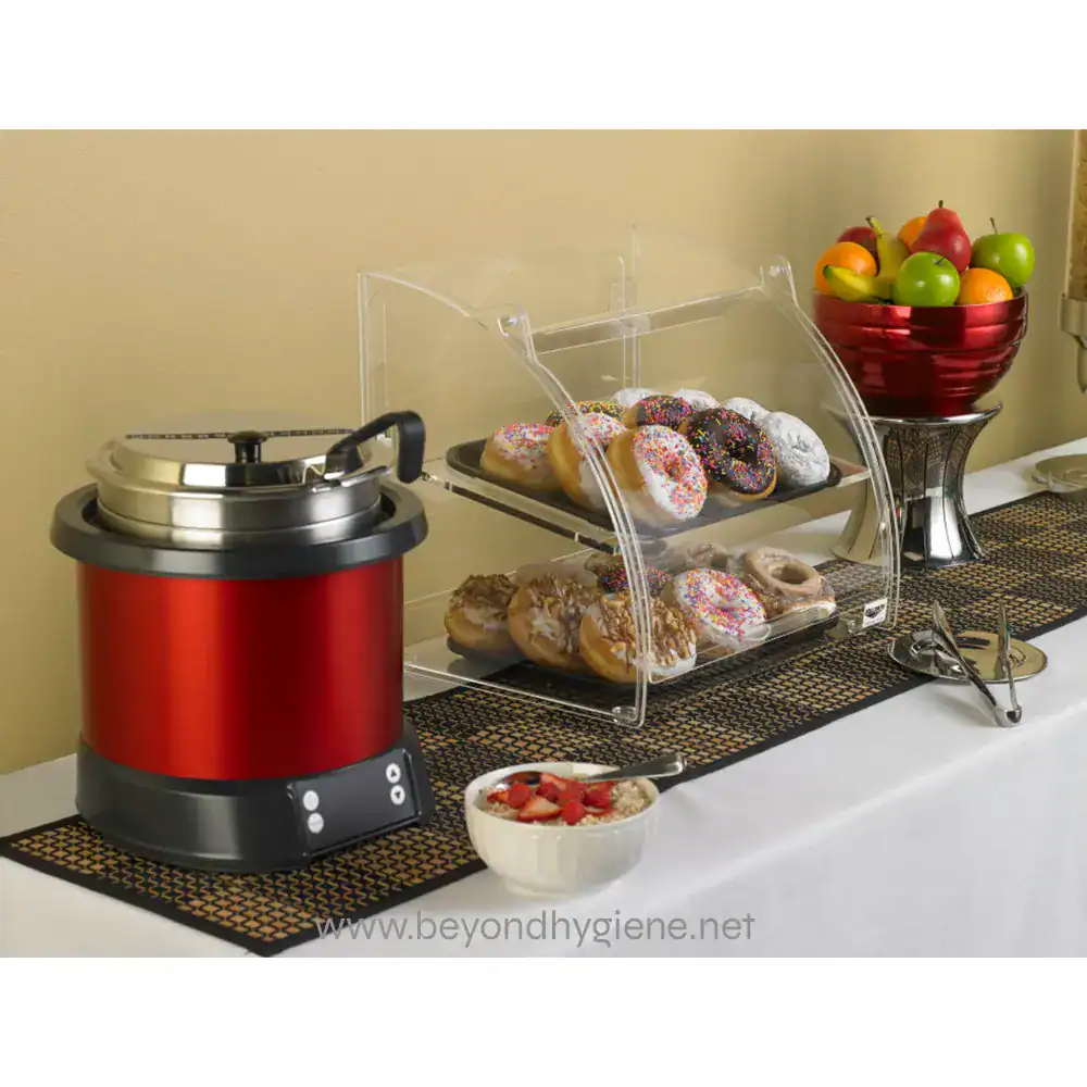 74110240_04 Freshly baked donuts and healthy fruit options on a buffet table, emphasizing hygiene and food safety standards at Beyond Hygiene Asia.