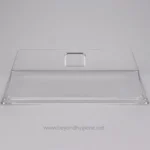 Clear acrylic hand sanitizer dispenser cover for hygiene and sanitation purposes.
