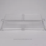 Clear acrylic sneeze guard with metal handles, ideal for hygienic partitions in Asian food service and hospitality settings.