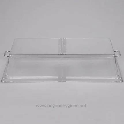 Clear acrylic sneeze guard with metal handles, ideal for hygienic partitions in Asian food service and hospitality settings.