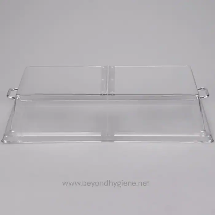 Clear acrylic sneeze guard with metal handles, ideal for hygienic partitions in Asian food service and hospitality settings.