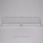 Acrylic sneeze guard barrier on a grey background, used for hygiene and safety in public and retail spaces.