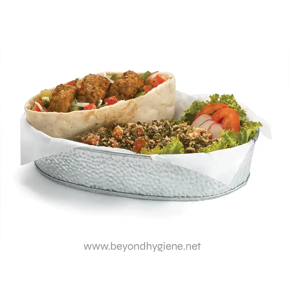 8 Freshly prepared salad in a metal bowl with vegetables and herbs, showcasing healthy and nutritious options from Beyond Hygiene Asia.