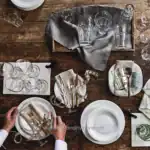 Crystal glassware set for dining table with linen napkins and gold cutlery, elegant table setting for special occasions, beyond hygiene asia cleaning and sanitization services in Asia.
