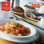 Fresh pasta with vegetables served on a white dish, highlighting Italian cuisine.