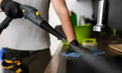 High-pressure steam cleaning being used on kitchen countertop for sanitation and hygiene, highlighting professional cleaning services by Beyond Hygiene Asia.