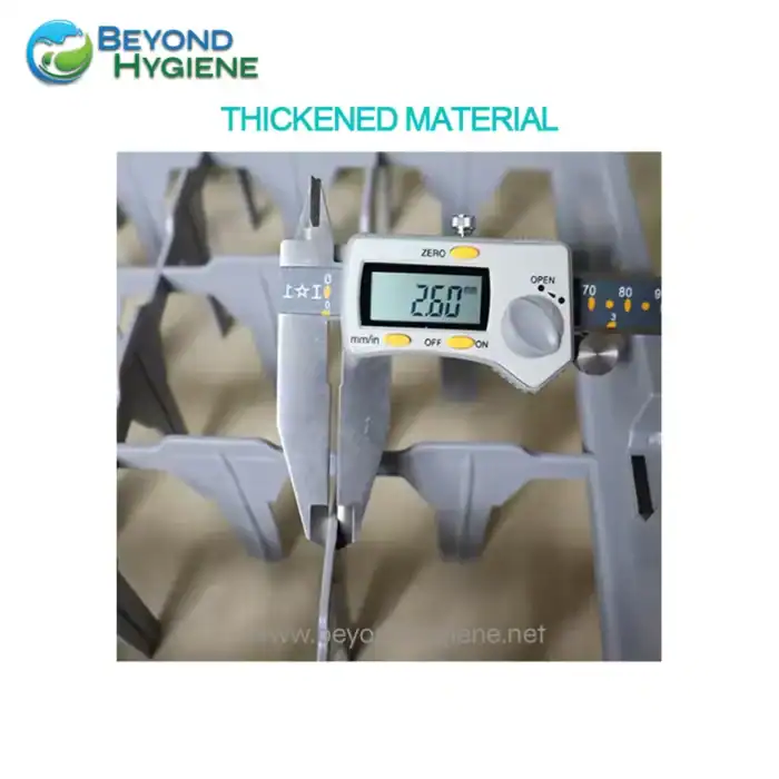 Digital caliper measuring thickness of quality material for hygiene products at Beyond Hygiene Asia.