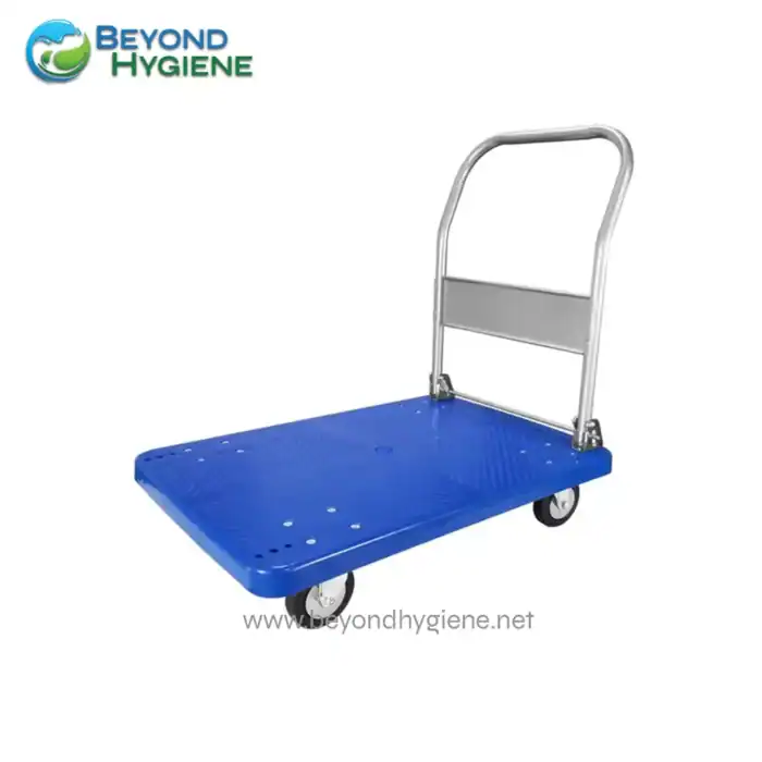 Lightweight blue platform trolley with metal handle, ideal for transportation of goods in warehouses and cleaning services, promoting efficient logistics and hygiene practices.