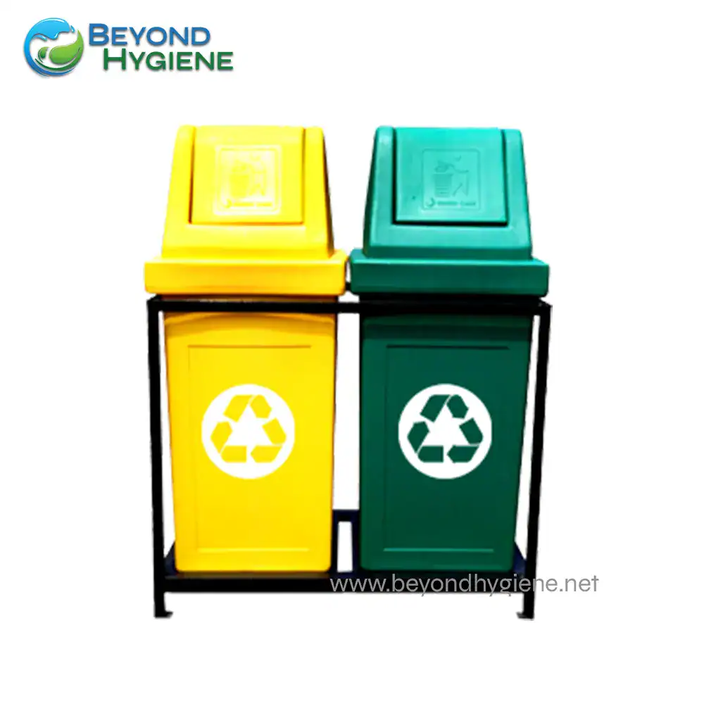 Waste Master Segregation 03 Yellow and green recycling bins on a black metal stand, eco-friendly waste segregation, Beyond Hygiene Asia, waste management solutions for environmental sustainability, recycling bins for different waste types.