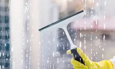 Glass cleaning tool, window cleaning, soapy window, cleaning equipment, hygiene maintenance, professional cleaning supplies, Beyond Hygiene Asia, sanitation services, cleaning technology, hygiene solutions.