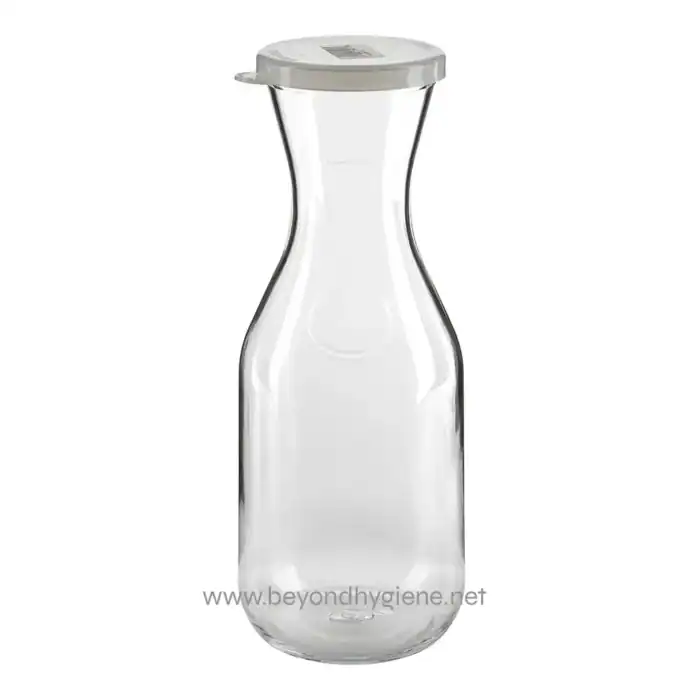Clear glass carafe for hygiene and sanitation purposes, ideal for beverages or containers in Asian healthcare and hospitality settings.