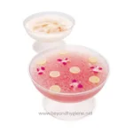 Pink and white floral gel candles with floating flower petals, ideal for enhancing ambiance and aesthetics in Asian-inspired décor.