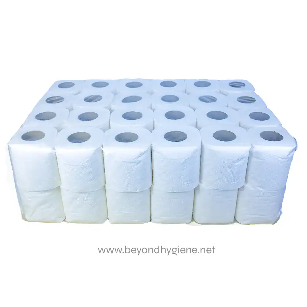 1 Soft white industrial toilet paper rolls stacked in a cleaning supplies storage.