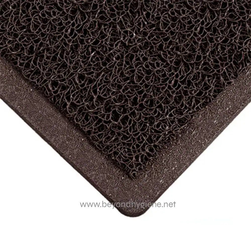 Flexible, dark brown entrance mat with durable, coarse surface for effective dirt and moisture removal in commercial or residential spaces at Beyond Hygiene Asia.