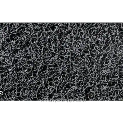 Hairbrush cleaning: tangled hair on a black brush surface for hygiene maintenance.