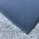 Commercial anti-slip rubber mat with textured surface for slip-resistant flooring in Asian workplaces, gyms, and public spaces, promoting safety and hygiene.