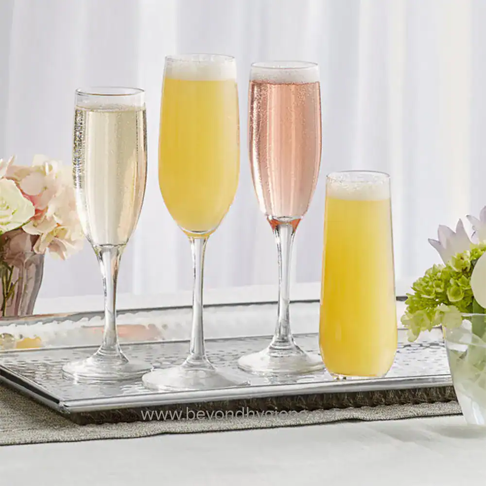 2285167 Elegant champagne glasses filled with sparkling beverages for celebrations, symbolizing hygiene and cleanliness in event settings.