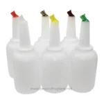 Multi-color tattoo ink bottles for tattooing, hygiene, and art supplies.