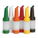 Green, white, orange, red, yellow, and black squeeze bottles for cleaning solutions at Beyond Hygiene Asia, specialized in hygiene and sanitation products for businesses and facilities.