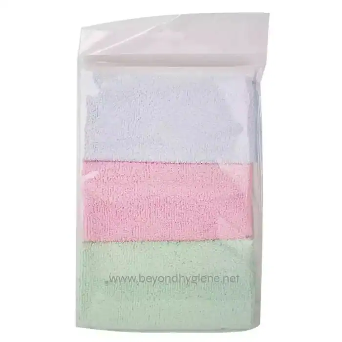 Soft pastel-colored microfiber cleaning cloths in white, pink, and green inside a clear resealable plastic bag for hygiene and cleaning.