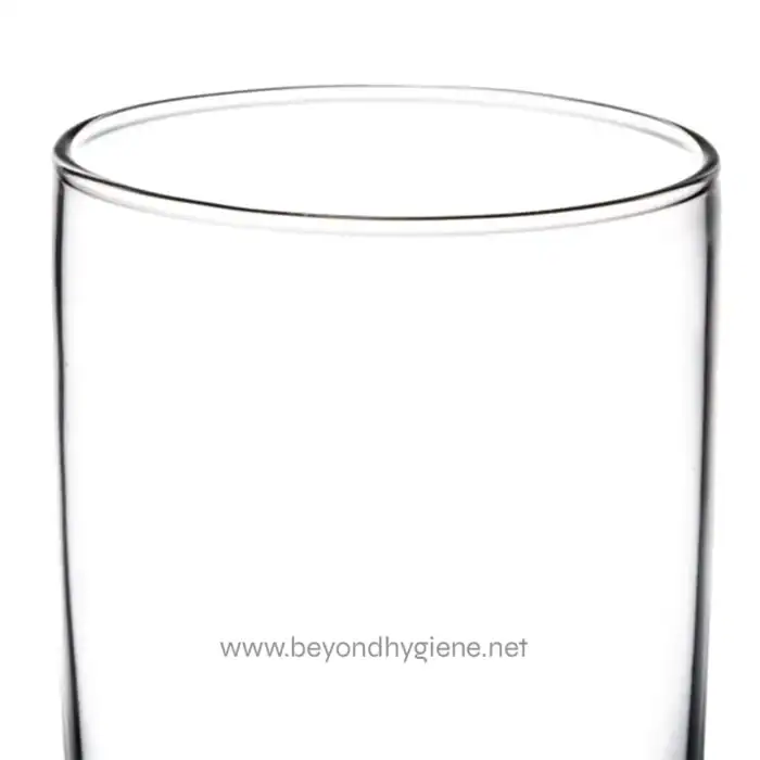 Clear empty drinking glass, minimalistic, for hygiene and cleanliness, suitable for food service and sanitation environments.