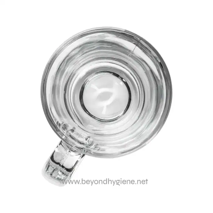 Clear glass mug with water, top view, promoting hygiene and cleanliness in beverage services.