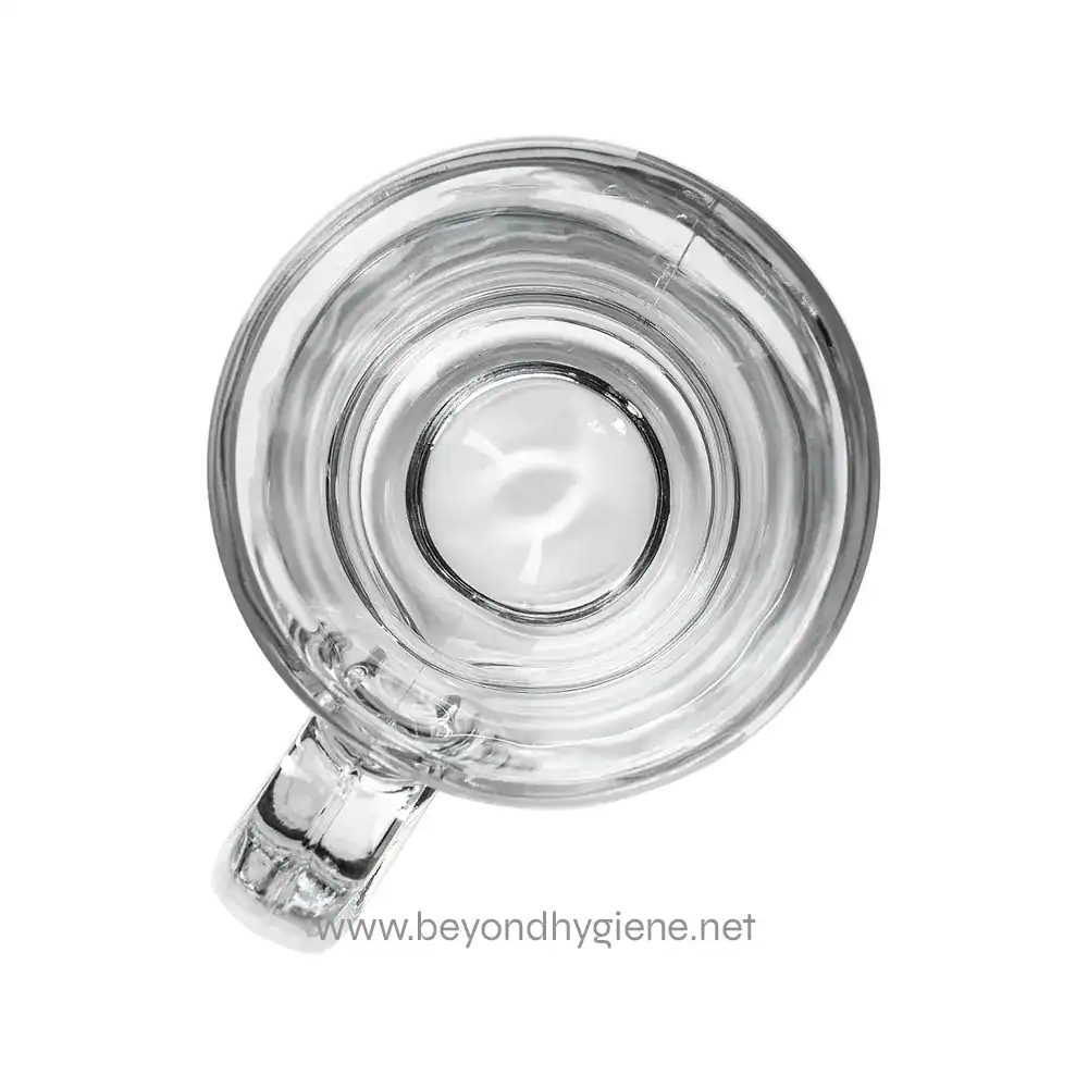 634-5298_007 Clear glass mug with water, top view, promoting hygiene and cleanliness in beverage services.