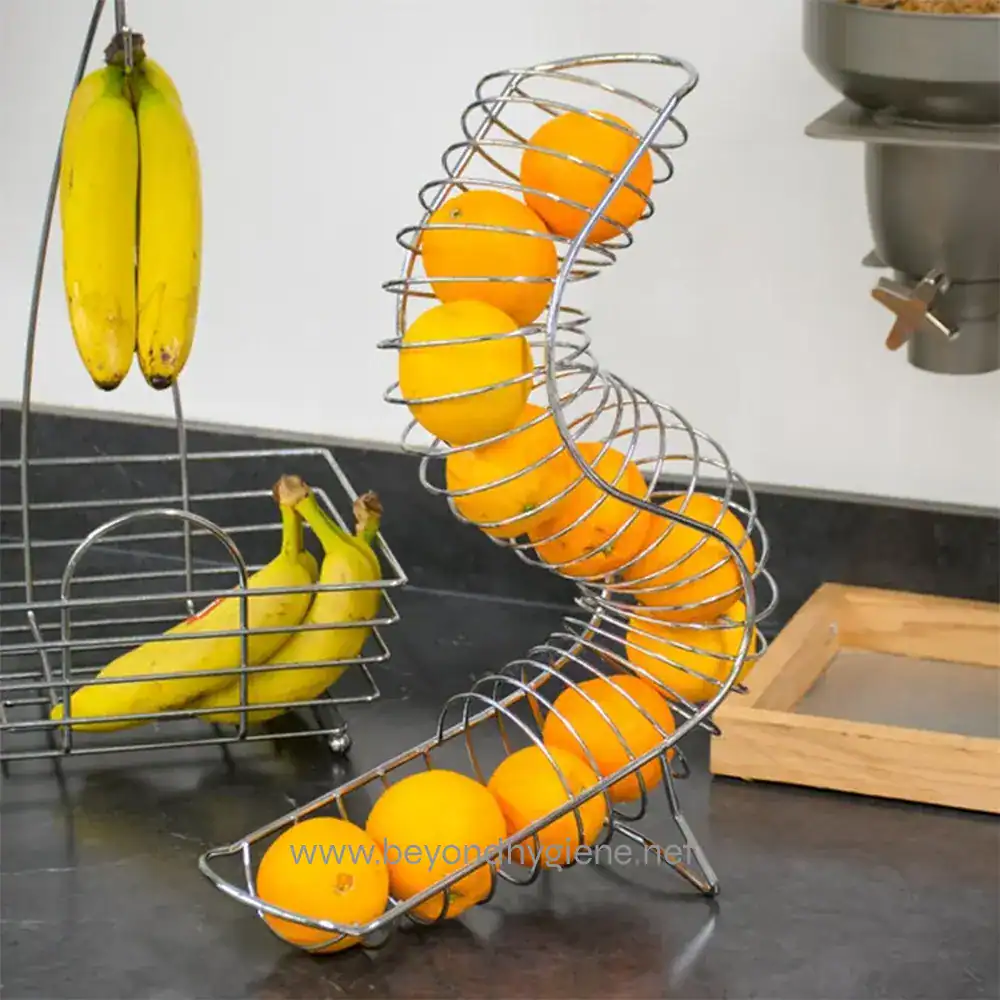 Banana and orange fruit holder in a modern kitchen setting for hygienic food storage.