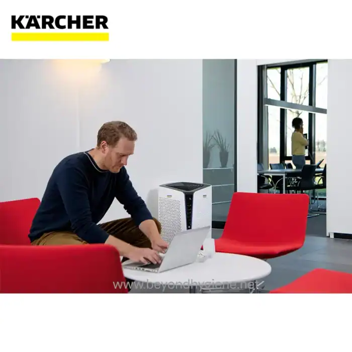 Disinfectant planning office environment with air purifier, beyond hygiene asia logo, clean and sanitized workspace, corporate sanitation solutions, Beyond Hygiene Asia branding.