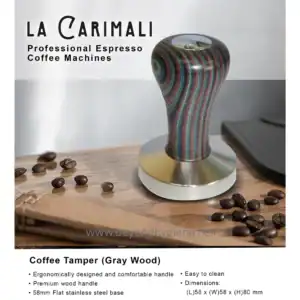Coffee tamper with colorful wood handle on wooden surface, professional espresso accessory for baristas.