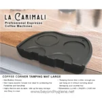 Black rubber coffee cup tamping mat with three circular indentations for espresso cups, designed for professional coffee machine use.