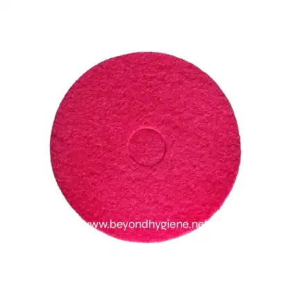Pink circular cleaning scrubber, ideal for hygiene and sanitation cleaning solutions.