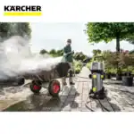 Karcher pressure washer in use for outdoor cleaning, demonstrating professional hygiene equipment for garden and patio sanitation, ideal for commercial and residential cleaning services.