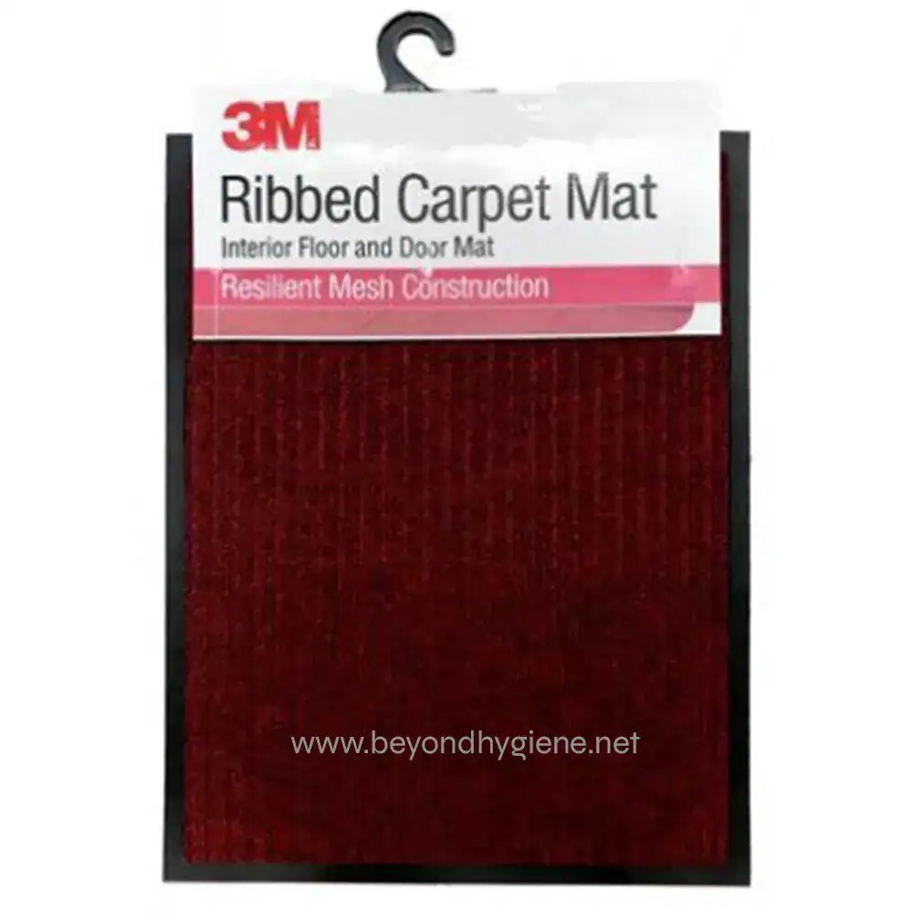 Red ribbed carpet mat for interior floors and doors, made with resilient mesh construction, ideal for commercial and office spaces, from Beyond Hygiene Asia.